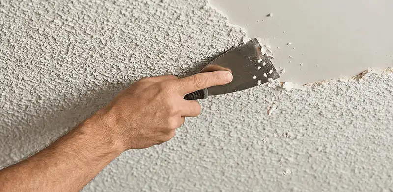 Popcorn ceiling removal scraping off textured ceiling finish in Arlington, TX
