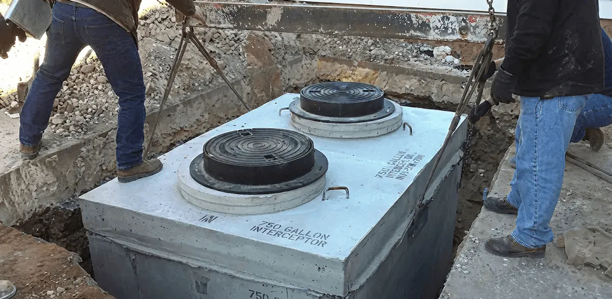 Grease trap installation for a commercial property drainage system in Arlington, TX