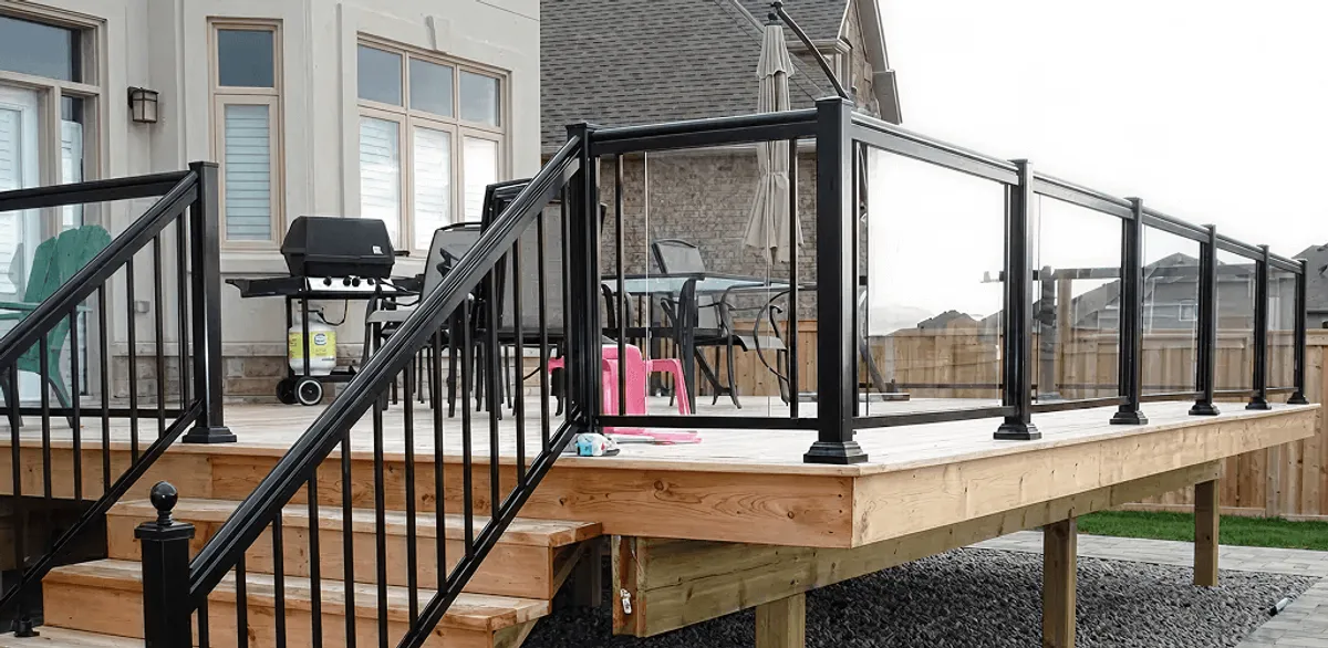 Handrail installation on a deck staircase for safety and code compliance in Arlington, TX