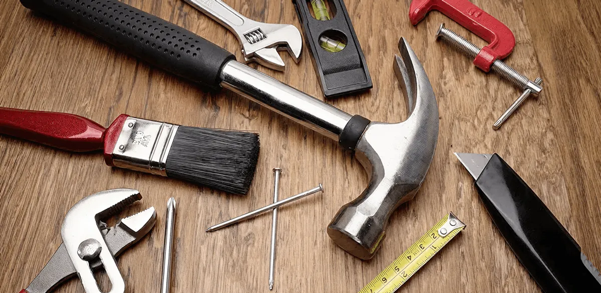 Handyman tools laid out for home repair and maintenance work in Arlington, TX