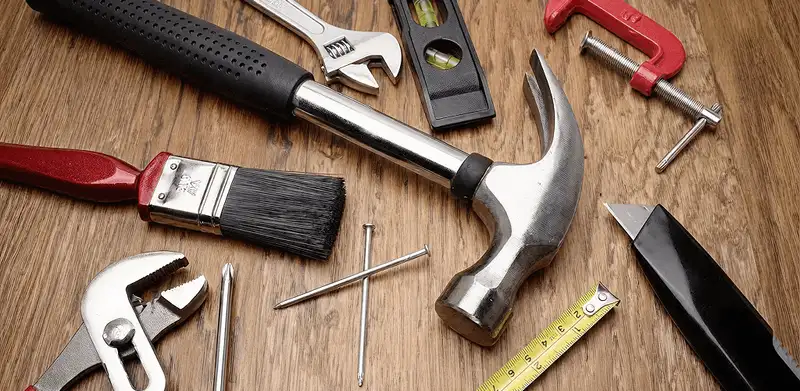 Handyman tools laid out for home repair and maintenance work in Arlington, TX